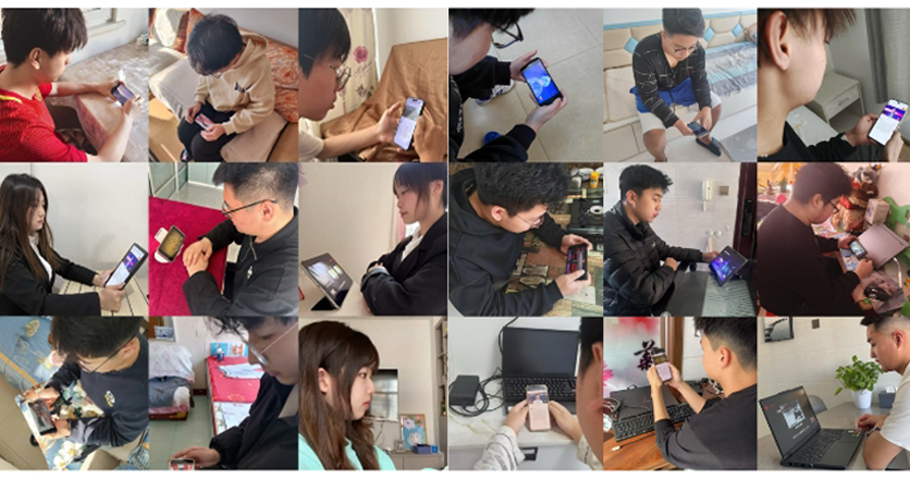 長春建筑學院學生收看直播。